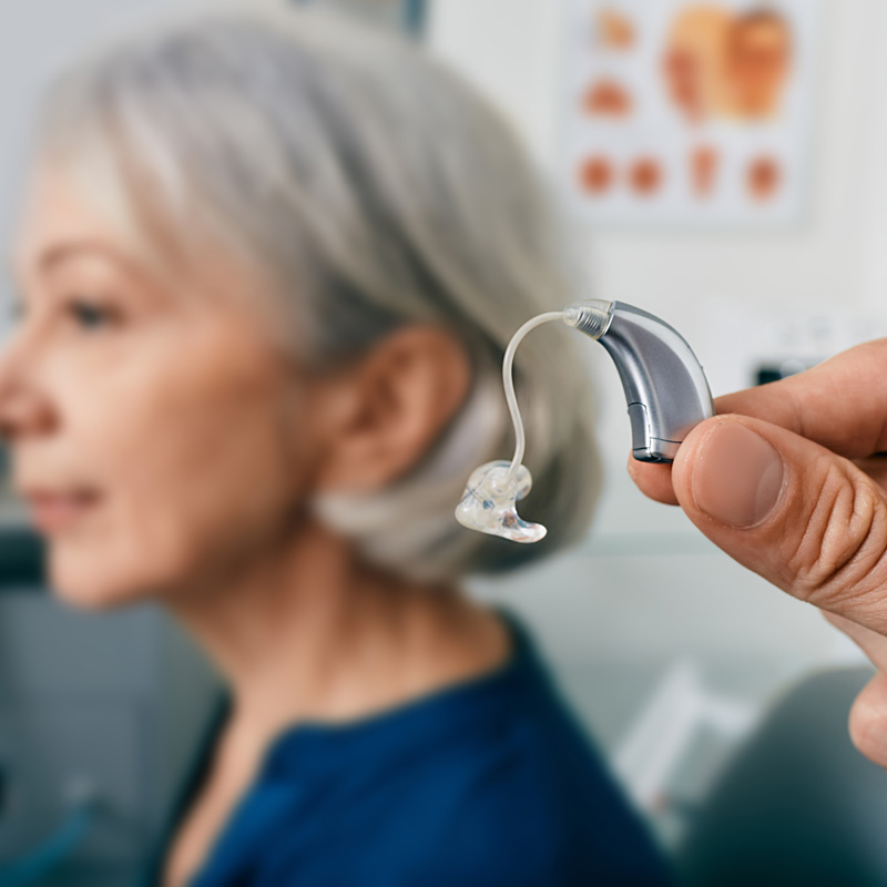 lady and hearing aid